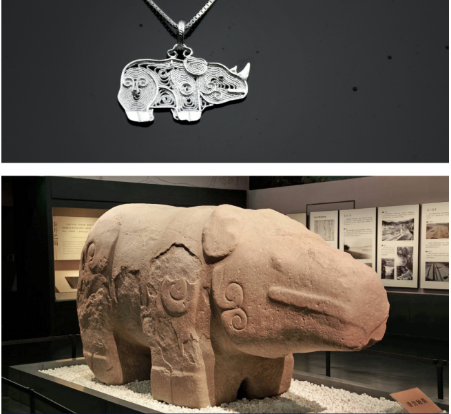 Upper - a pendant designed after the Stone Rhino Water Guardian Beast