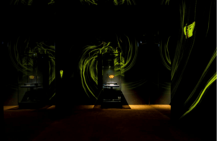 Illuminated display of ancient artifacts.