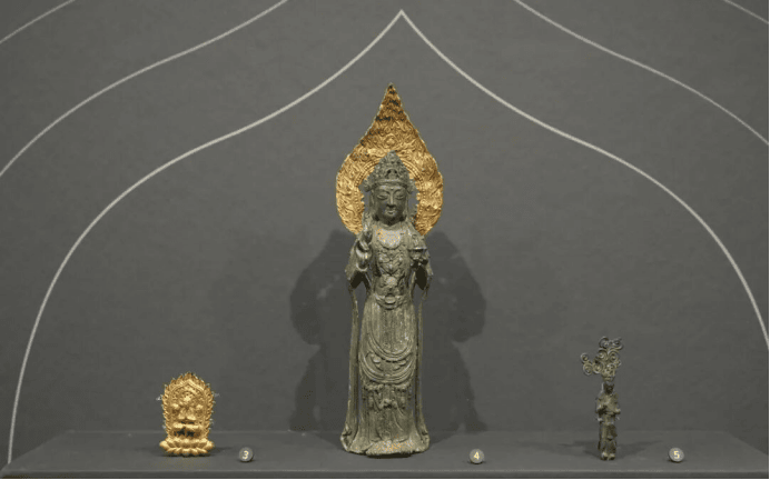 Ancient statues with intricate designs.