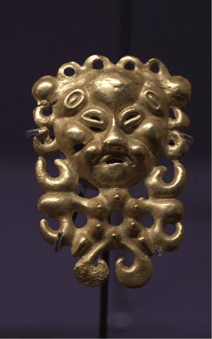 Intricate ancient gold artifact design