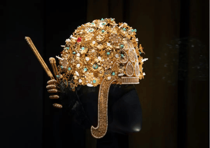 Intricate gold headdress with gemstones